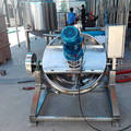 Tilting jacketed kettle for cooking sauce